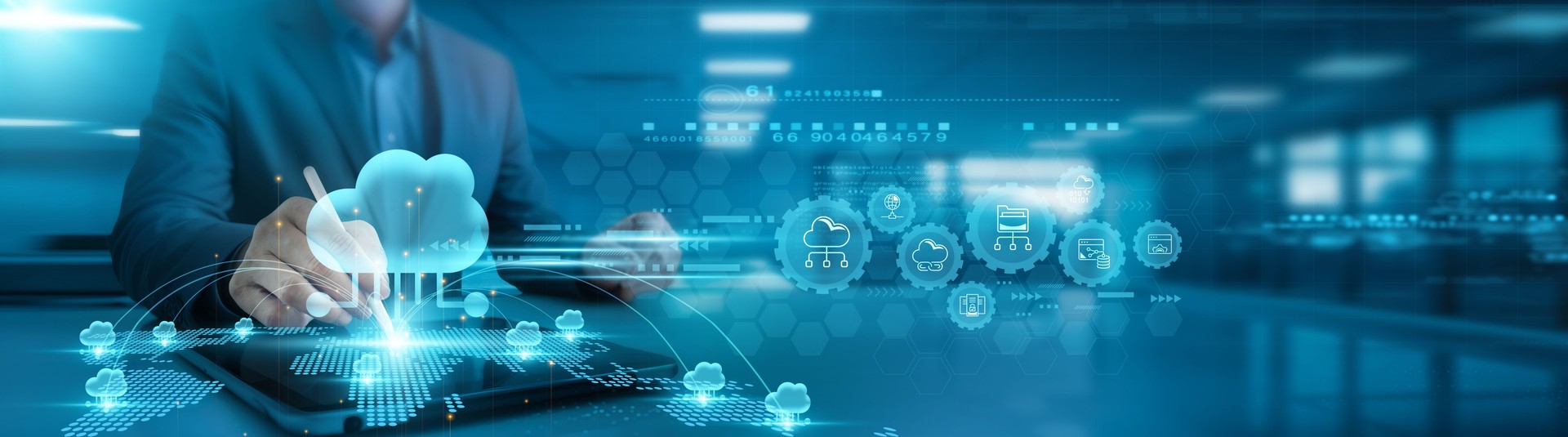 Cloud computing. Businessman analyzing data trends and cloud computing metrics on office table with tab, cloud computing infrastructure, cloud-based analytics, and other related services.